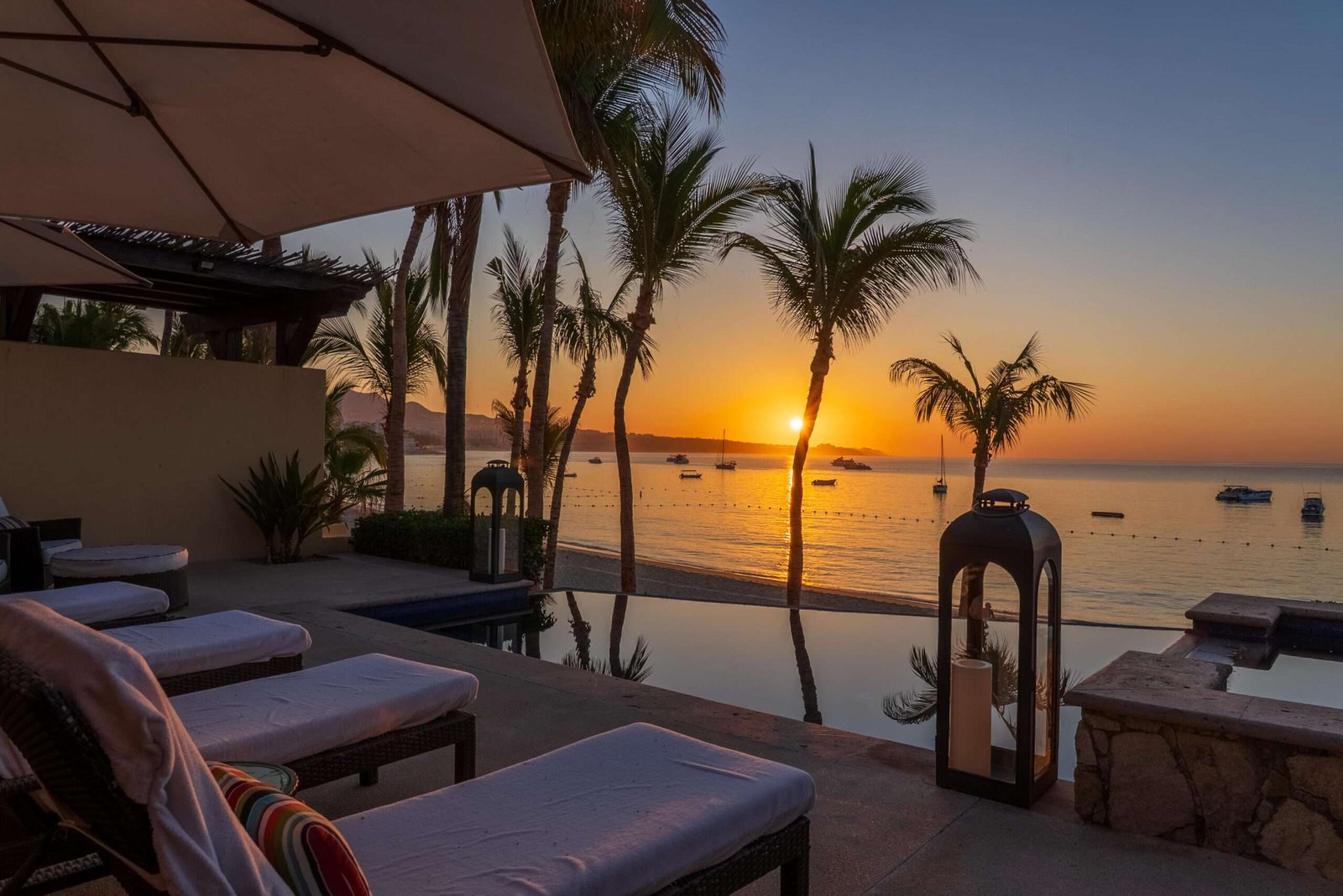 Maravilla Las Tunas The Nacuii Residence is a refined luxury home crafted to exceed the expectations of even the most discerning buyer. Nestled on a generous and private 3,000 m² lot (0.73 acres), it's just a short, effortless stroll to the untouched, sandy shores of Las Tunas — perfect for enjoying the serene coastal landscape and dramatic sunsets. The home offers a thoughtful layout with 3 spacious bedrooms, a separate studio, a cozy TV lounge, and 6 full bathrooms, including two principal suites, a guest room, a detached studio, and a dedicated media or family room. Expansive sliding glass doors invite natural light throughout the interiors while showcasing tranquil garden for sale