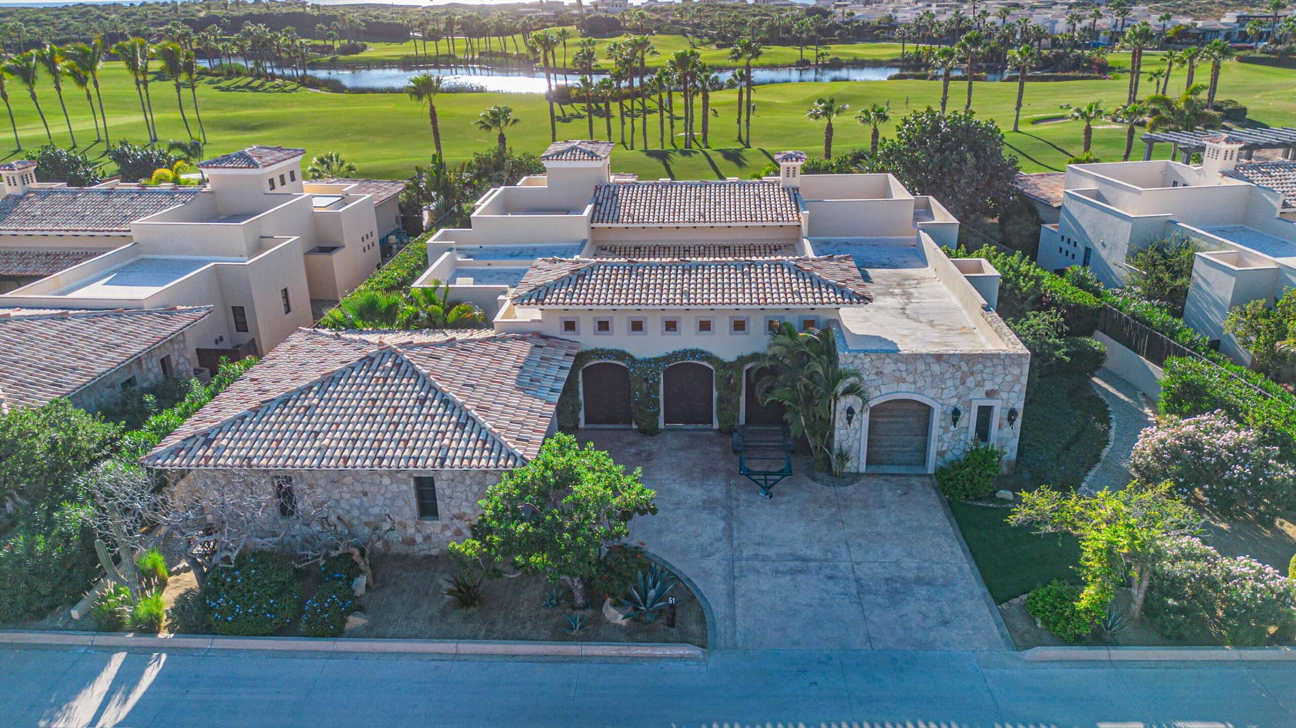 Maravilla Golf Villas Set along the lush Bermuda fairways of the Tiger Woods-designed Oasis Short Course, this exceptional five-bedroom hacienda-style residence blends classic Mexican architecture with refined contemporary luxury. A grand central courtyard opens to an expansive great room that flows seamlessly to a private terrace with heated pool, palapa swim-up bar, and fire-pit lounge overlooking the Oasis par-three course. Designed for effortless entertaining, the home features multiple indoor and outdoor living spaces, a gourmet kitchen, and a covered outdoor grill ideal for hosting family and friends. As a Legacy Club home at Diamante Cabo San Lucas, ownership provides access to championship golf, the iconic Crystal Lagoon®, spa, beach club dining, and miles of Pacific coastline. for sale