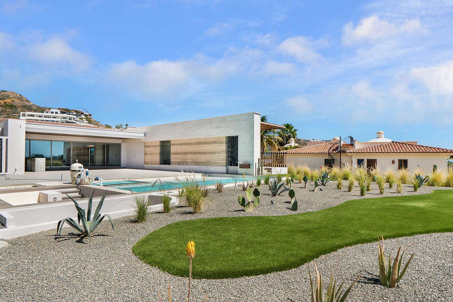 Maravilla Las Terrazas Set along the 15th hole of the El Cardonal Golf Course, panoramic vistas extend from rolling fairways to the Pacific, delivering striking sunrises and sunsets.This four-bedroom, 4.5-bath home blends refined design with seamless indoor-outdoor living. Open-concept interiors feature Palecek furnishings, while each bathroom showcases hand-painted Mexican tile for warmth and authenticity.Outdoor living includes a private pool and elevated hot tub, outdoor grill and wet bar, lush landscaping, and expansive terraces with golf course and ocean for sale