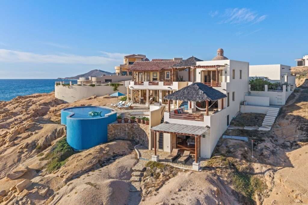 Maravilla Rancholasmargaritas Casa Playa Escondida - Oceanfront Luxury in Baja California SurPerched dramatically on the rocks above the Pacific Ocean, Casa Playa Escondida is a rare oceanfront retreat set along a secluded, pristine stretch of beach. Located within the exclusive off-grid gated community of Rancho Las Margaritas, this one-of-a-kind property offers privacy, tranquility, and breathtaking natural beauty--just a 20-minute drive to the dining and shopping of Cabo San Lucas, 40 minutes from Los Cabos International Airport, and approximately 30 minutes south of Cerritos and Todos Santos.The residence features three spacious ensuite bedrooms, each privately situated yet connected by terraces, pathways, and shared gathering spaces. A dedicated media room offers flexibility as a fourth bedroom or additional guest suite.Expansive terraces and multiple lounging areas provide a variety of vantage points to take in the surrounding landscape, from the rugged coastline to the endless Pacific horizon.The gourmet kitchen is equipped with high-end appliances and designed for both functionality and style. A warm and inviting living and dining area, anchored by a striking fireplace, creates the perfect space for entertaining or relaxing with family and friends. The home is offered fully furnished with includes modern off-grid conveniences such as solar power.Outdoor living is equally exceptional, featuring a swimming pool, firepit, grilling area, and multiple seating spaces--ideal for enjoying the serene coastal setting – 75 Avenue de Marlin, Pacific, BS