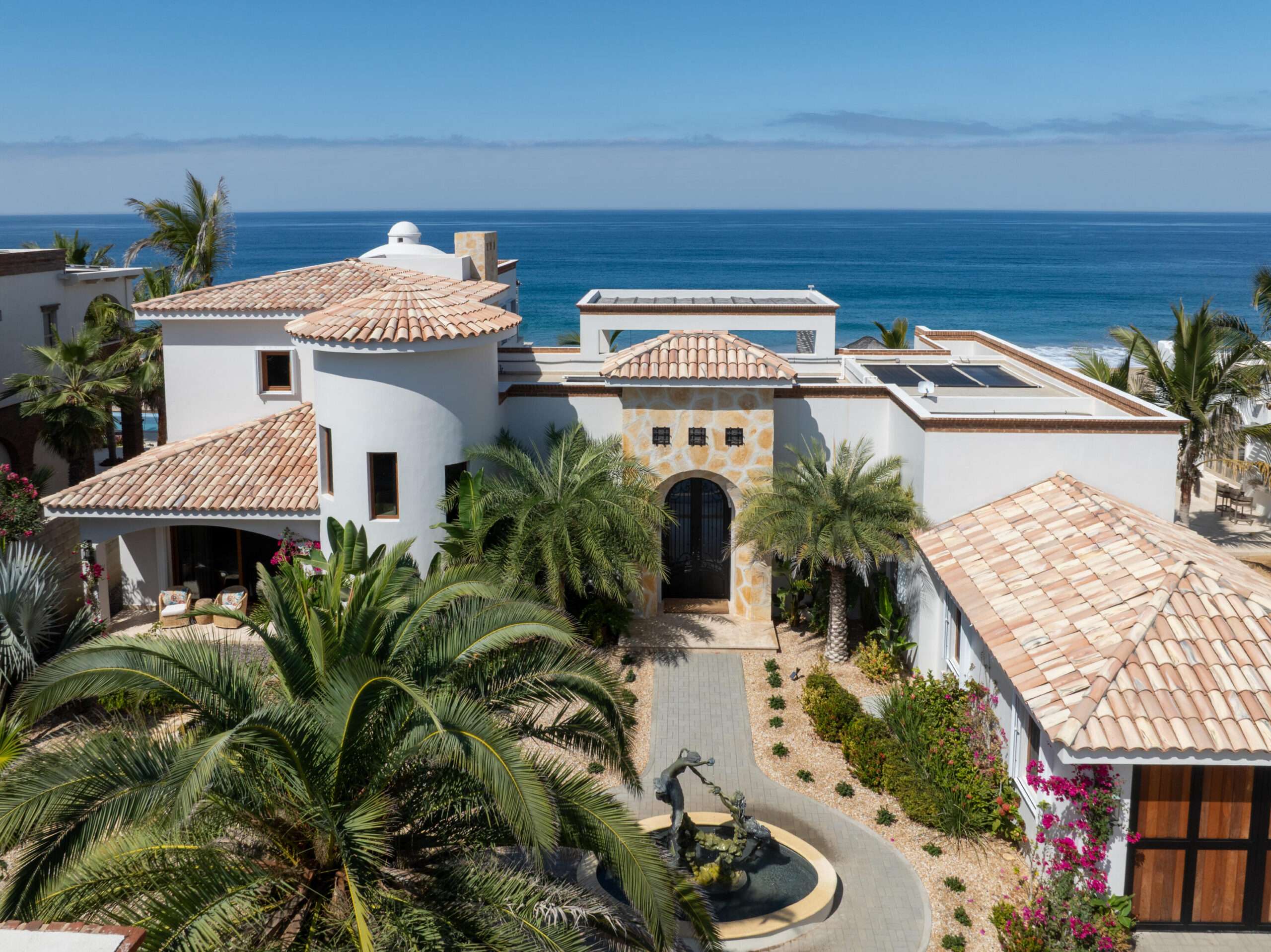 Maravilla Rancho Nuevo This is a one of a kind estate property consisting of two oceanfront homes. The oceanfront estate with 3 grand bedrooms/4.5 baths, interior/exterior living, 2 kitchens, 2 dining areas, butler's pantry, 2 laundry rooms, and attached garage. Two primary suites are situated upstairs and downstairs.. No expense was spared in exquisite high end finish out such a brick bovedas, brick barrel kitchen ceiling, Heston appliances.Onyx countertops with hidden electrical outlets. This estate was built with the highest quality of materials and design. Dual pane hurricane doors and windows plus hurricane shutters encompassing even the covered patio. The orientation is perfectly situated to capture the Pacific, which sits on 3000m2 lot, walled with electronic gated car gate located high on a bluff. See mo Imagine only 35 minutes from Cabo San Lucas and 15 minutes from Todos Santos, lies the oceanfront gated community known as Rancho Nuevo. This one of a kind estate property consists of an oceanfront home with 3 oversized suites all with luxurious en suite bathrooms, walk-in closets, of which two are oceanfront. The upstairs primary has two terraces, one with built in seating compete with a fire pit. The home was constructed with the highest quality materials and orientation to take in the ocean – Casa San Pedrito double lot, Pacific, Pacific, BS