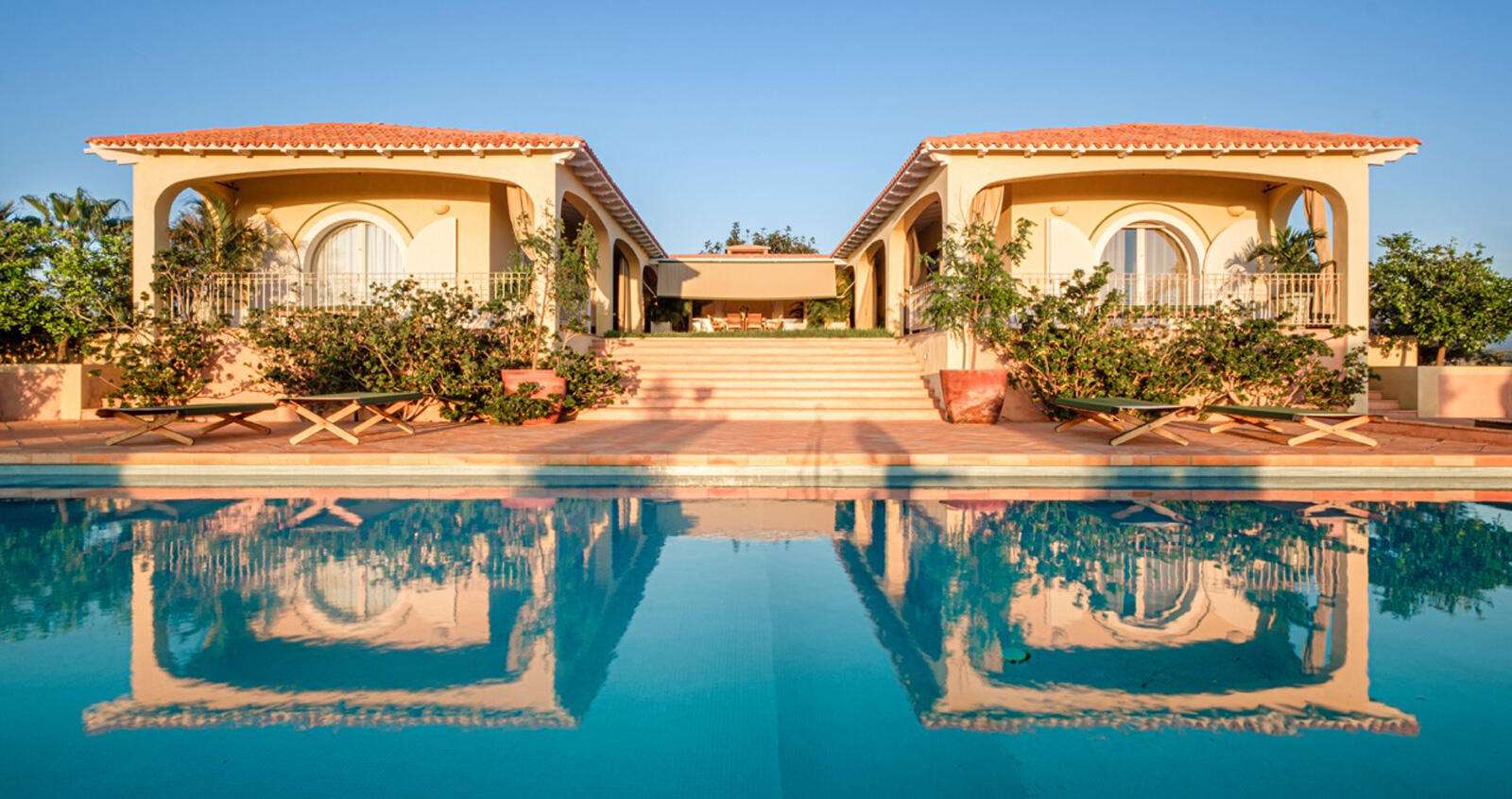 Maravilla Todos Santos-General Iconic Mediterranean-style residence nestled in the desert of Baja California Sur. This estate is perfectly suited for a private full-time residence, high-end boutique hotel, luxury vacation rental, or exclusive destination venue. Built to the highest standards, the mansion features double-glazed windows and marine mahogany doors imported from Europe. The interior combines international quality with Mexican craftsmanship, including handmade Saltillo-style mosaics throughout. The gourmet kitchen, equipped with designer appliances and handcrafted tiles, flows seamlessly into a great room and a terrace offering limitless for sale