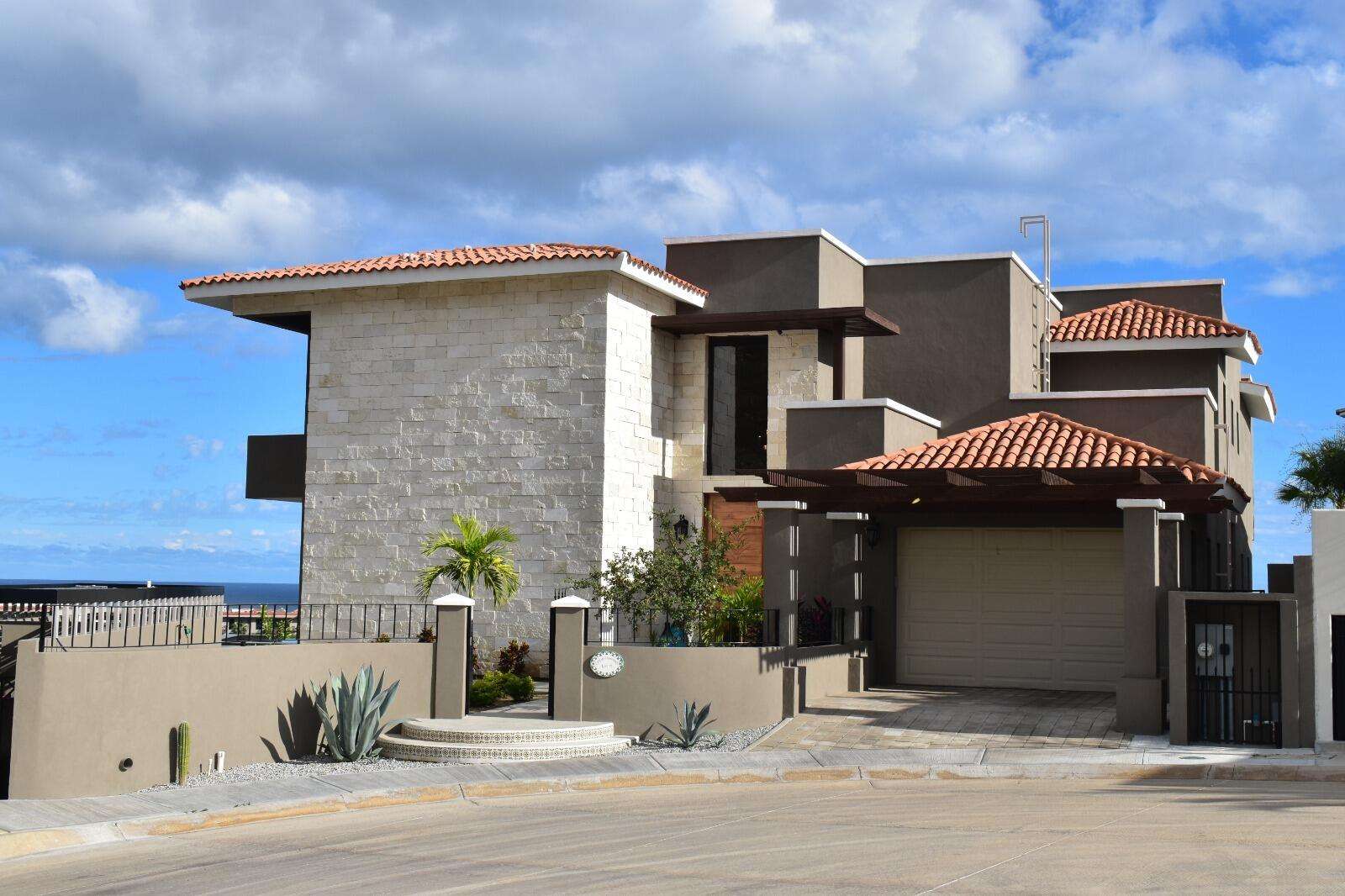 Maravilla Vista Lagos This beautiful fully furnished property, named ''Casa de Hermanos,'' is built on two levels and features 5 bedrooms and 6 bathrooms, an entertainment room, and a two-level entry. The living room and dining room (with seating for 10) open to a very large kitchen and a service area. On the terrace there is a pool with a Jacuzzi, a fire pit area with sun loungers, and a Kitche with a BBQ Area, including Sink & Fridge. Most extraordinary are the for sale