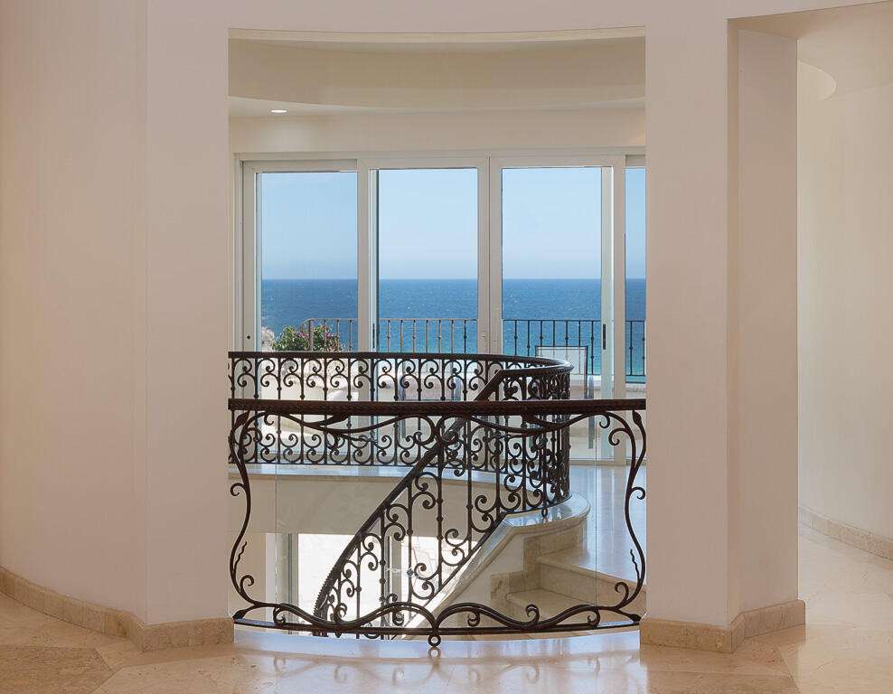 Maravilla Pedregal Csl Villa Marcella sits on an exquisite piece of ocean front property in the exclusive community of Pedregal in Cabo San Lucas. This 6 bedroom 9 bathroom beach estate has a very private location with it's natural mountainside to it's left that make it perfect for entertaining large beach parties, family gatherings, it has even been known to host quite a few a weddings. The beach estate consists of outdoor fire pit, Olympic size swimming pool, jacuzzi, outdoor cooking area, indoor game and bar room accessible from the beach. Enjoy the long beach walks and beautiful Pacific sunrises and sunsets from this beach home. Excellent INVESTMENT property or private home on the beach. for sale
