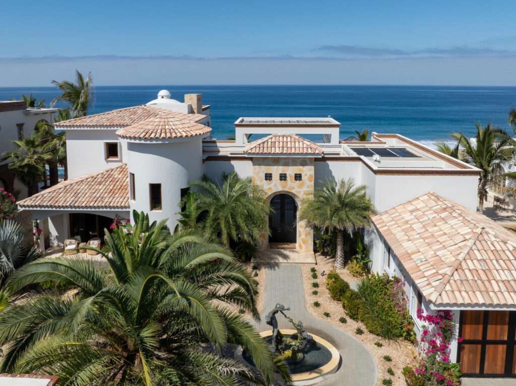 Maravilla Rancho Nuevo This is a one of a kind estate property consisting of two oceanfront homes. The oceanfront estate with 3 grand bedrooms/4.5 baths, interior/exterior living, 2 kitchens, 2 dining areas, butler's pantry, 2 laundry rooms, and attached garage. Two primary suites are situated upstairs and downstairs.. No expense was spared in exquisite high end finish out such a brick bovedas, brick barrel kitchen ceiling, Heston appliances.Onyx countertops with hidden electrical outlets. This estate was built with the highest quality of materials and design. Dual pane hurricane doors and windows plus hurricane shutters encompassing even the covered patio. The orientation is perfectly situated to capture the Pacific, which sits on 3000m2 lot, walled with electronic gated car gate located high on a bluff. See mo Imagine only 35 minutes from Cabo San Lucas and 15 minutes from Todos Santos, lies the oceanfront gated community known as Rancho Nuevo. This one of a kind estate property consists of an oceanfront home with 3 oversized suites all with luxurious en suite bathrooms, walk-in closets, of which two are oceanfront. The upstairs primary has two terraces, one with built in seating compete with a fire pit. The home was constructed with the highest quality materials and orientation to take in the ocean – Ocean Drive, Pacific, BS
