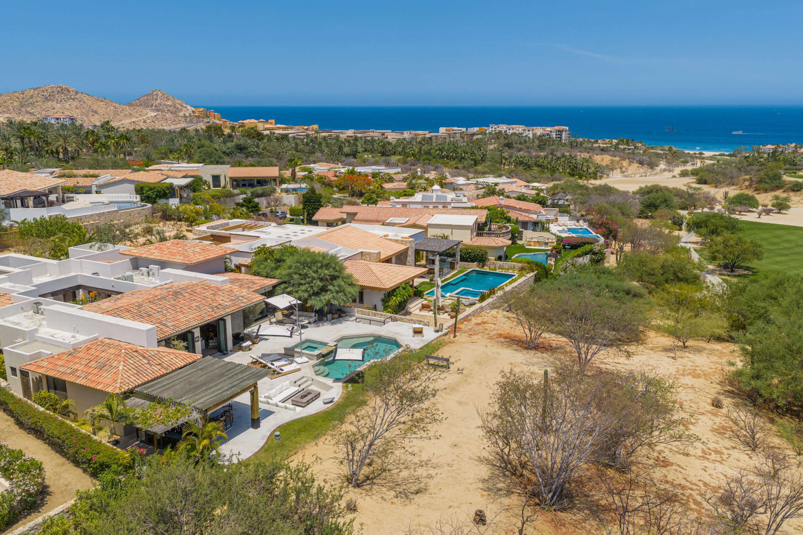 Maravilla Brisas Discover Naah Payil, an exceptional estate where the warmth of a Contemporary Mexican Hacienda blends seamlessly with the relaxed sophistication of coastal living. Located within one of Los Cabos' most exclusive and secure communities, this architectural masterpiece was custom-designed by MCA, led by renowned architect Antonio Carrera. Thoughtfully enhanced in 2015 and again in 2025, the residence beautifully balances timeless character with today's highest standards of comfort and design. At the heart of the home, a central courtyard anchored by a signature tree creates a tranquil gathering space filled with natural light. The home's thoughtful design embraces effortless indoor-outdoor living. Open the grand living room doors, and refreshing ocean breezes naturally flow throughout the residence, creating a comfortable and inviting atmosphere – 12 Cabo del Sol Brisas, Cabo Corridor, BS